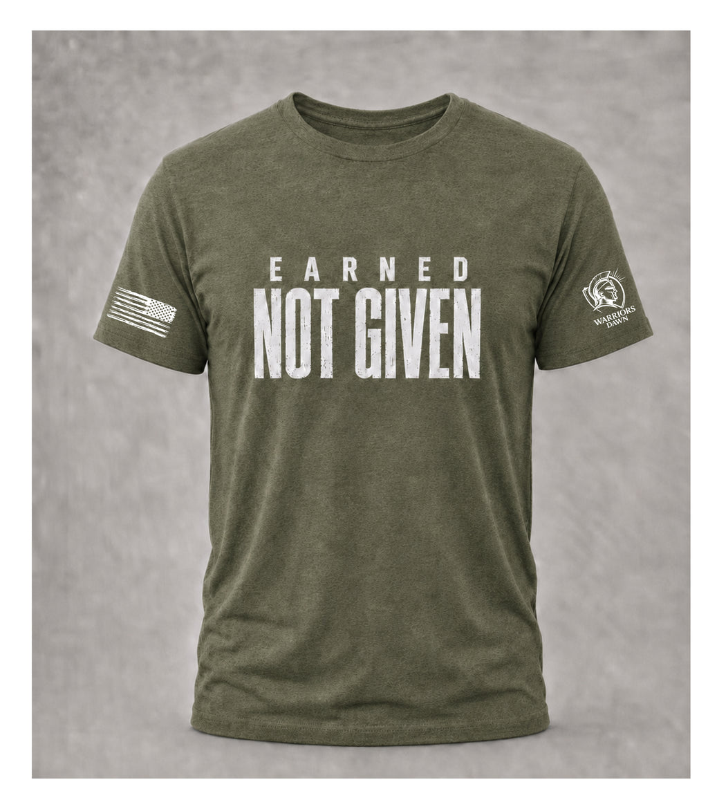 Green Warriors Dawn T-shirt with distressed white Earned Not Given front design, American flag on right sleeve and Warriors Dawn logo on left sleeve.